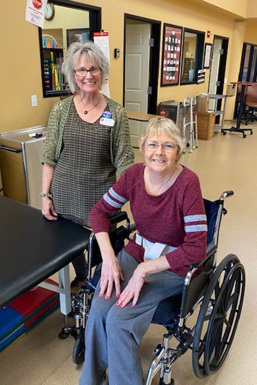 Janis Dunahoo, licensed practical nurse (right), with Kate Burt, occupational therapist assistant